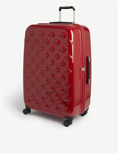 lulu guinness large suitcase.